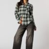 Haut boutonné à manche longue en flanelle à carreaux