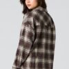 Haut boutonné à manche longue en flanelle à carreaux